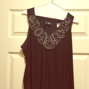 Black sleeveless top with zipper roses